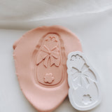 Bunny looking up stamp and cutter