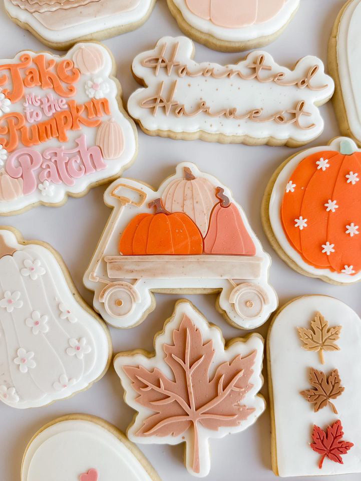 Pull cart full of pumpkin stamp and cutter