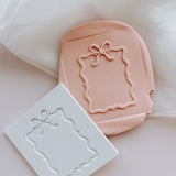 Christmas bow & ribbon border frame BLANK with matching mini embossers debosser stamp and cutter