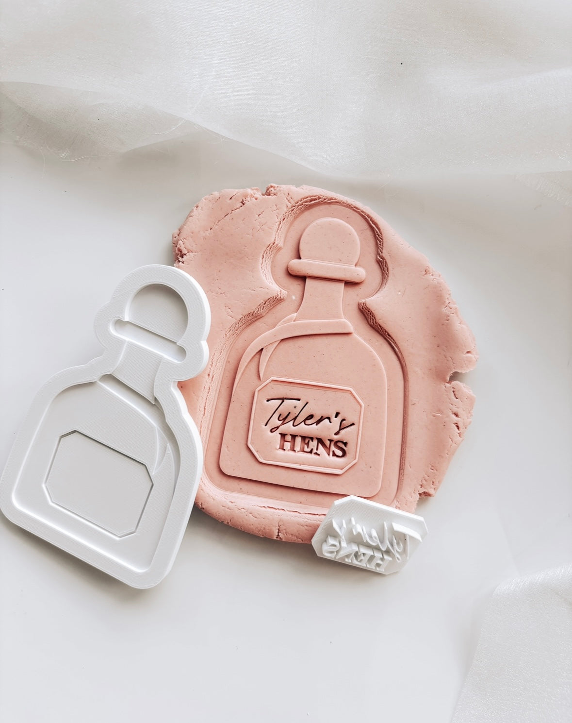 Tequila Patron bottle with customisable label stamp and cutters set