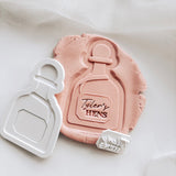 Tequila Patron bottle with customisable label stamp and cutters set