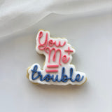 You + me = trouble stamp and cutter