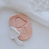 Single umbrella shaped toadstool stamp and cutter