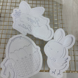 Odd Bunch- eggs in rattan basket, happy easter banner with details & easter chick
