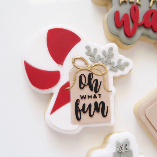 Thick candy cane with bow “OH WHAT FUN” tag stamp and cutter