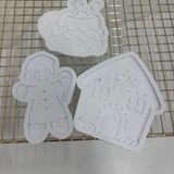 Odd Bunch- gingerbread man with candy cane, gingerbread house & tree mug