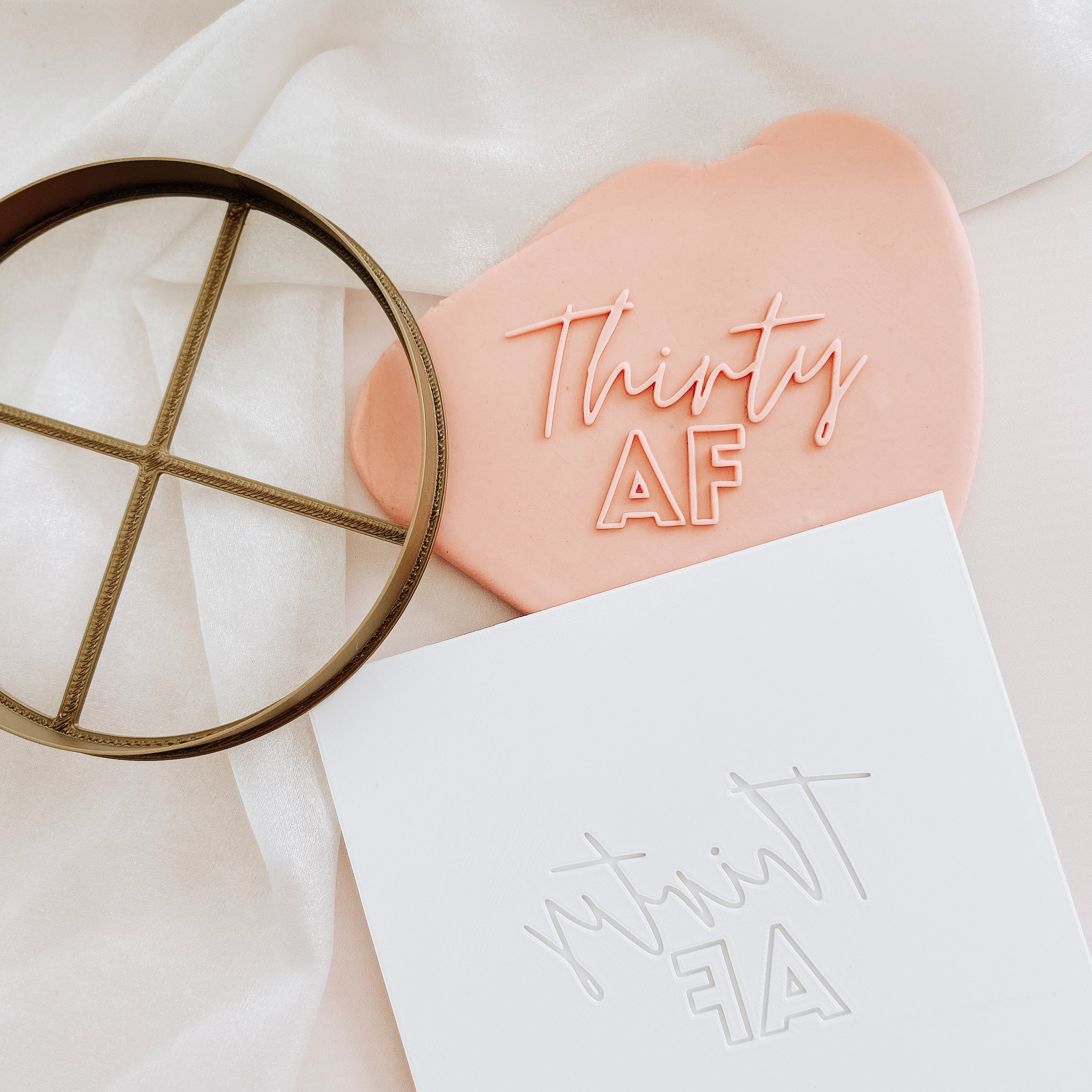 Thirty AF cake plate and cutter