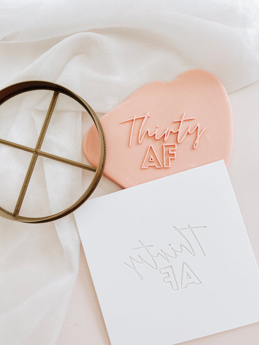 Thirty AF cake plate and cutter