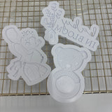 Odd Bunch-pregnancy belly with florals, bear rattle ring & baby in bloom