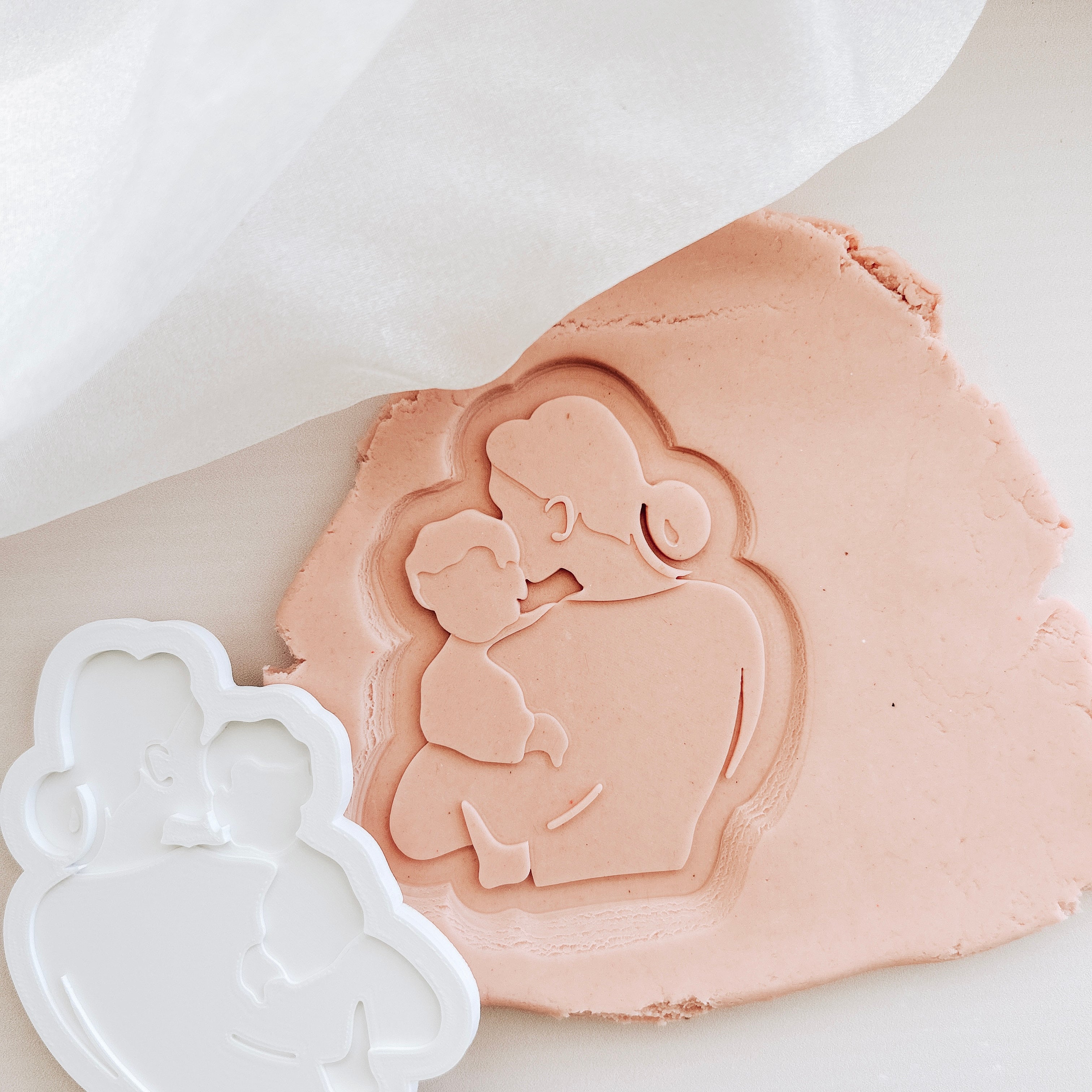 Mother’s Day silhouette- baby looking over shoulder stamp and cutter