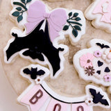Cute bat hanging from bow on branch stamp and cutter