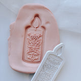 The miracle candle stamp and cutter