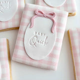 Oval with bow stamp and cutter