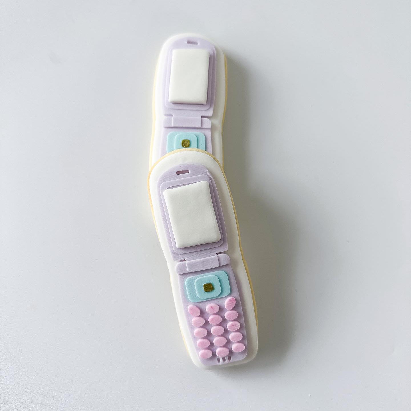 Flip phone stamp and cutter