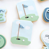 First golf hole with flag debosser and cutter