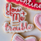 You + me = trouble stamp and cutter