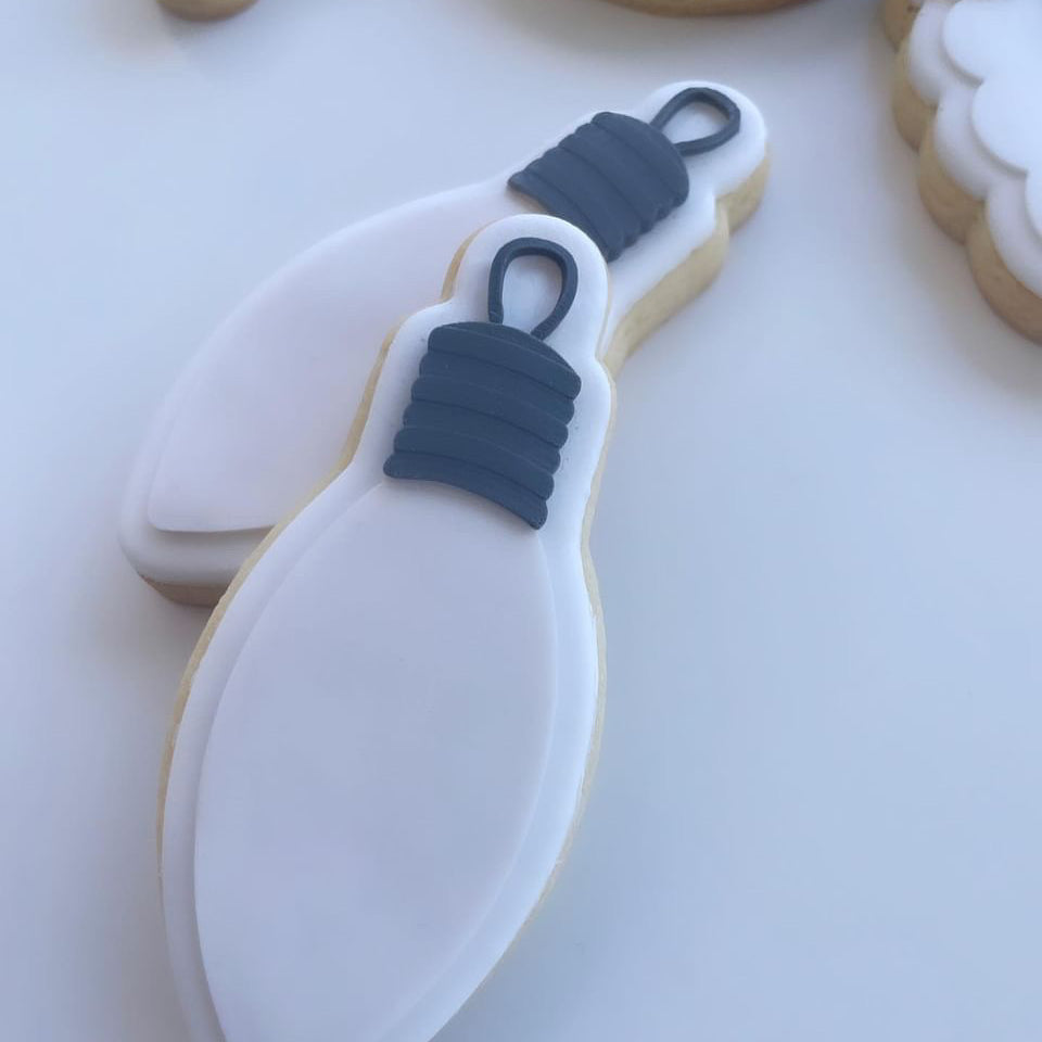 Light bulb debosser and cutter