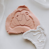 Croissant with bow stamp and cutter