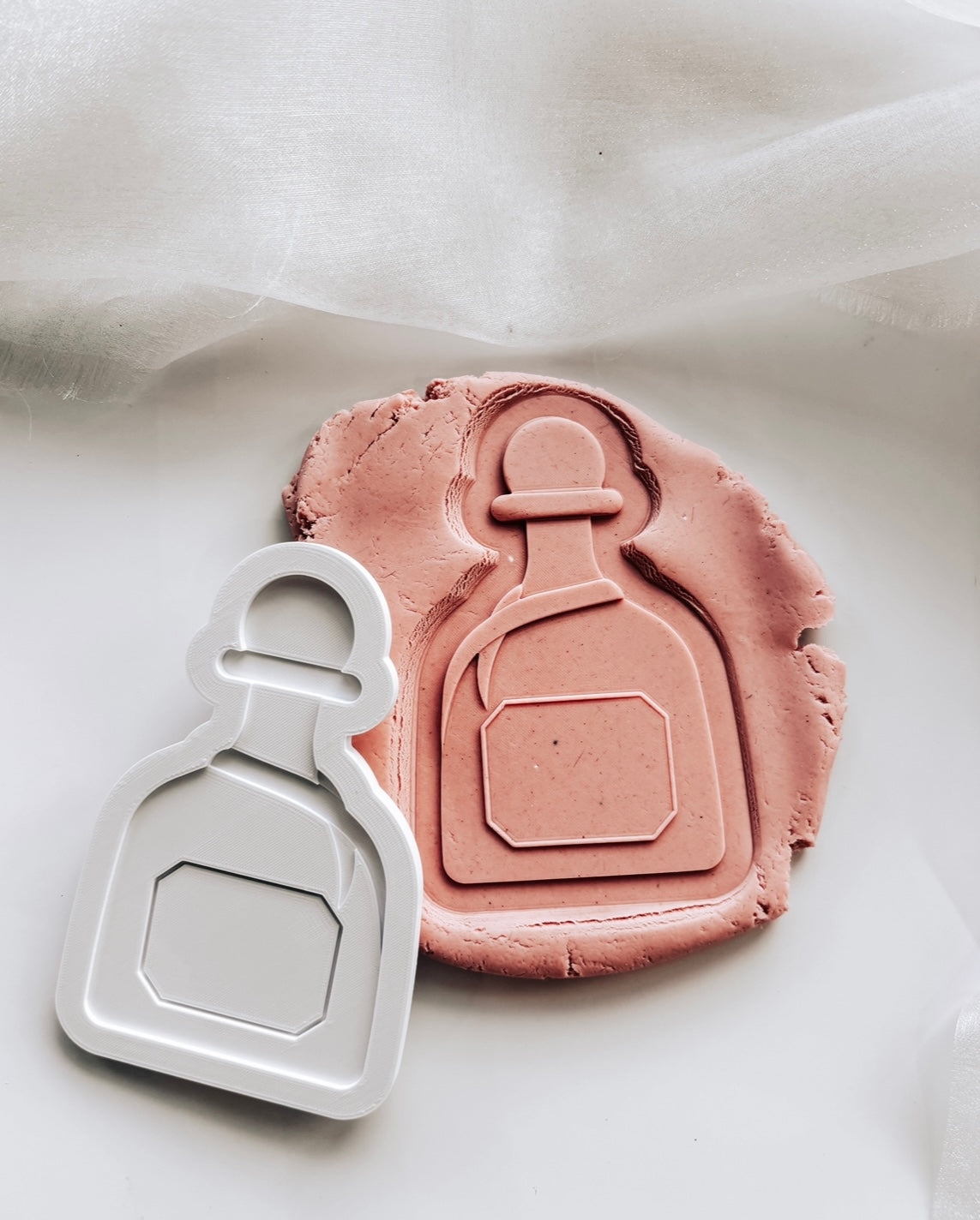 Tequila Patron bottle with customisable label stamp and cutters set