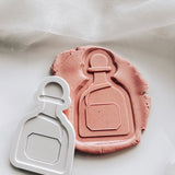 Tequila Patron bottle with customisable label stamp and cutters set