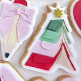 Books in the shape of Christmas tree debosser and cutter