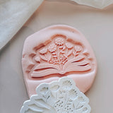 Floral filled book stamp and cutter
