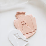 Glinda in arch stamp and cutter