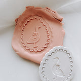 Scalloped egg with duck stamp and cutter