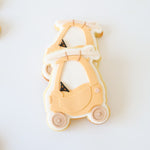 Tyke with surfboard stamp and cutter