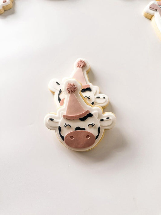 Cow head with party hat stamp and cutter