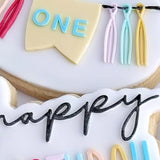 ONE Tassel banner oval stamp and cutter