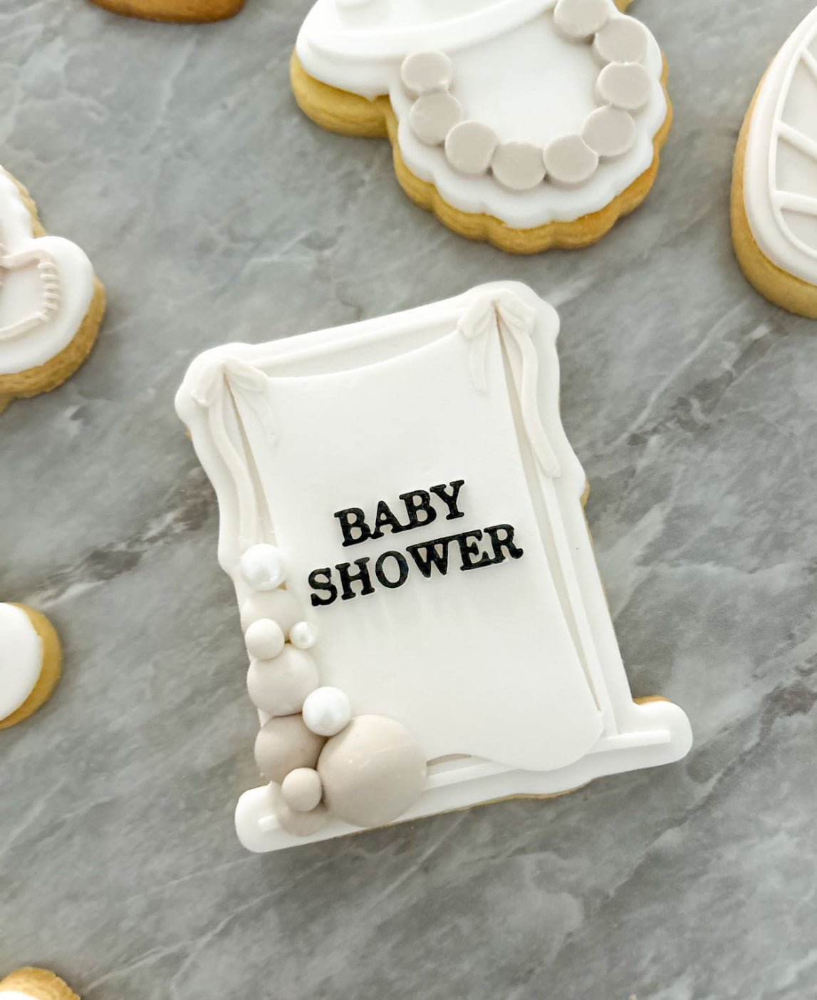 “BABY SHOWER” Draped material frame with bow on rectangle based stamp and cutter