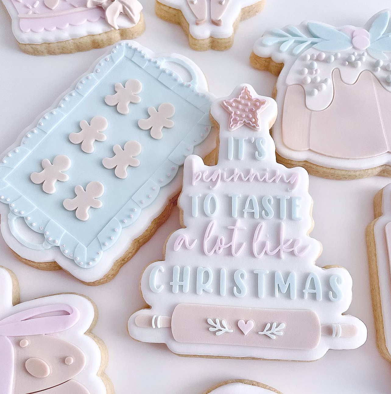 Tray of gingerbread men debosser and cutter