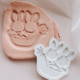 Bunnies in basket stamp and cutter