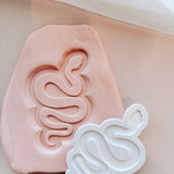 Slithering snake stamp and cutter