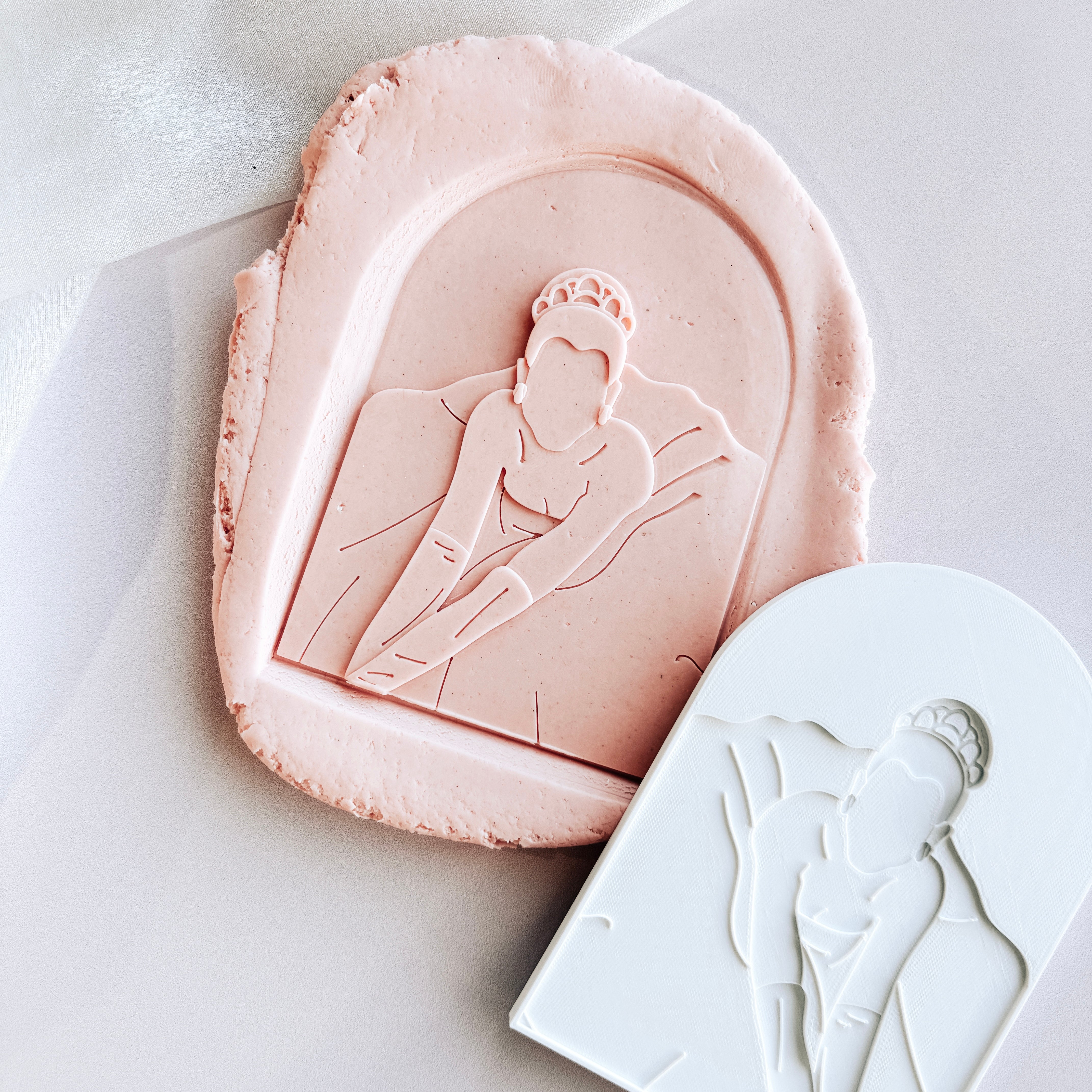 Princess sitting in gown arch stamp and cutter