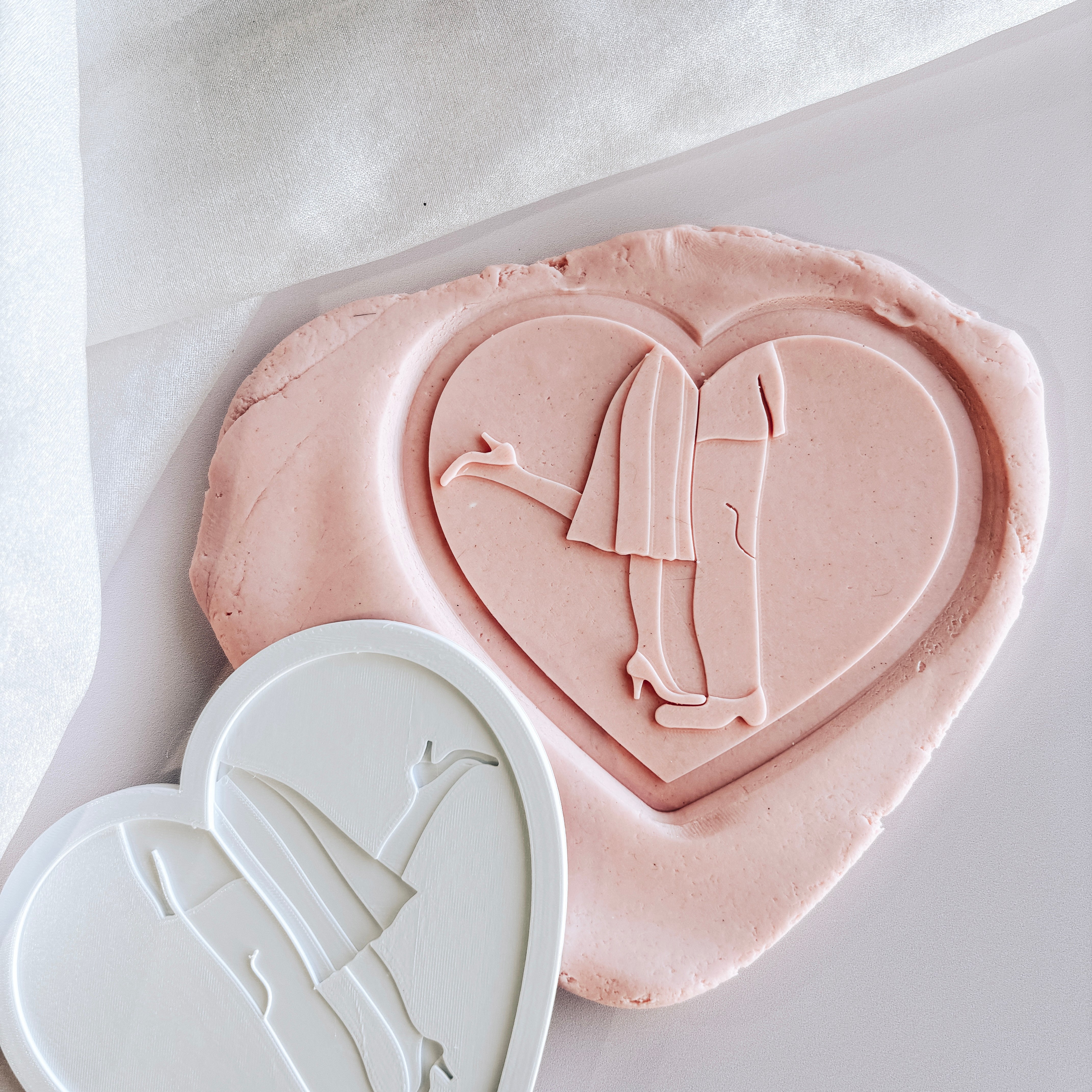 Foot popping kiss in heart stamp and cutter