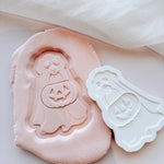 Ghost dog with pumpkin treat bag and outfit stamp and cutter