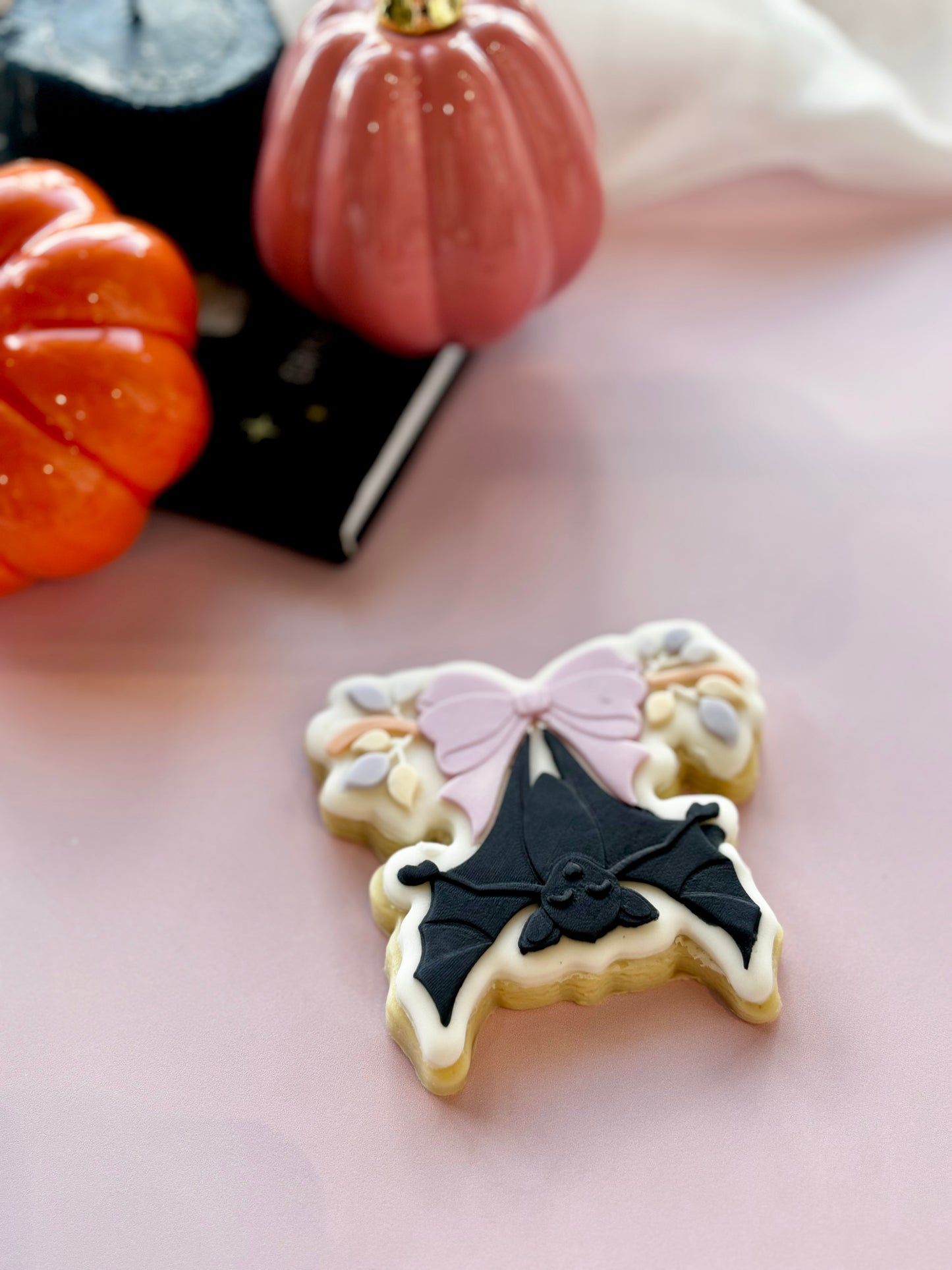 Cute bat hanging from bow on branch stamp and cutter