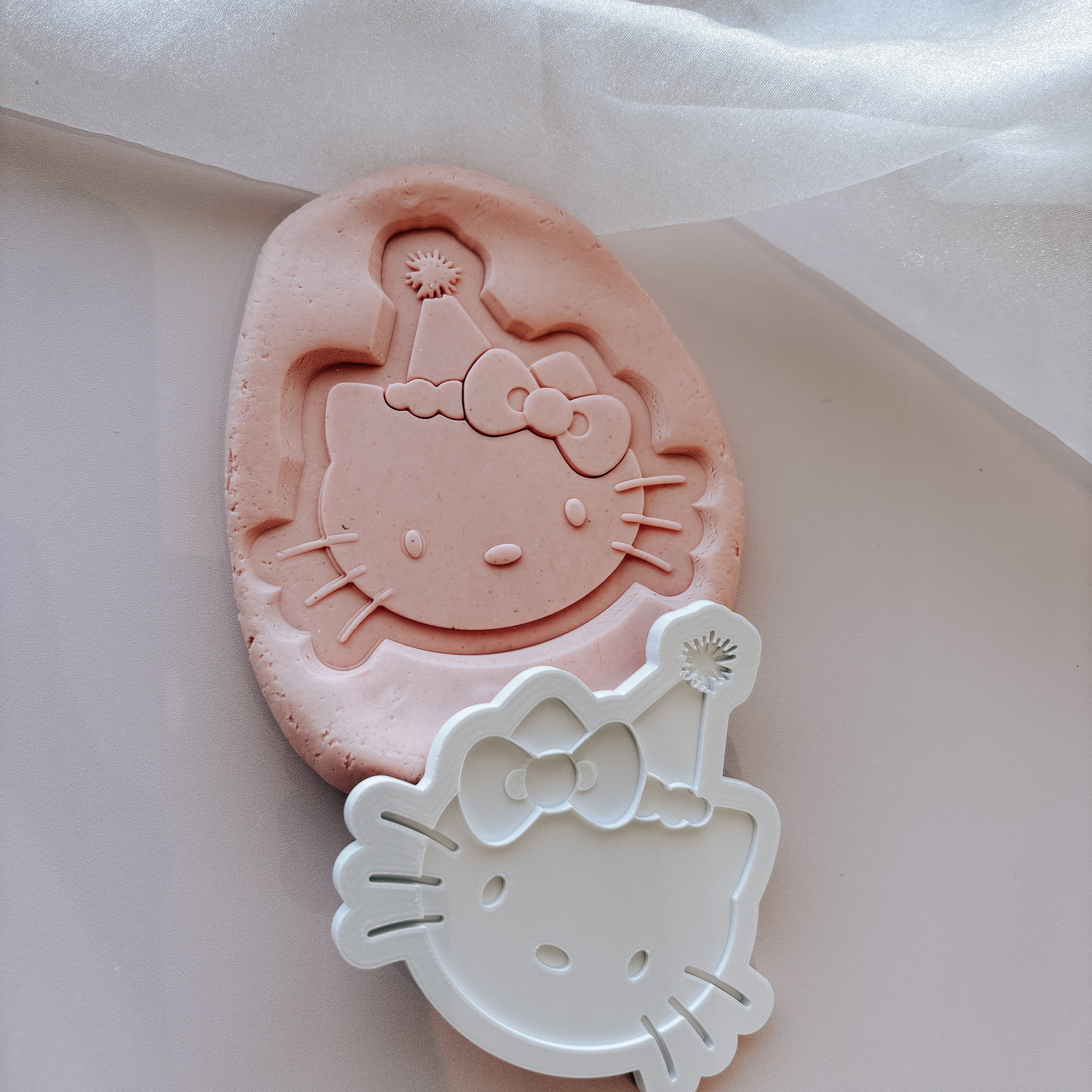 Hello Kitty head with party hat stamp and cutter