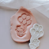 Hello Kitty holding a bunch of balloons stamp and cutter