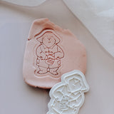 Paddington bear standing with jar stamp and cutter