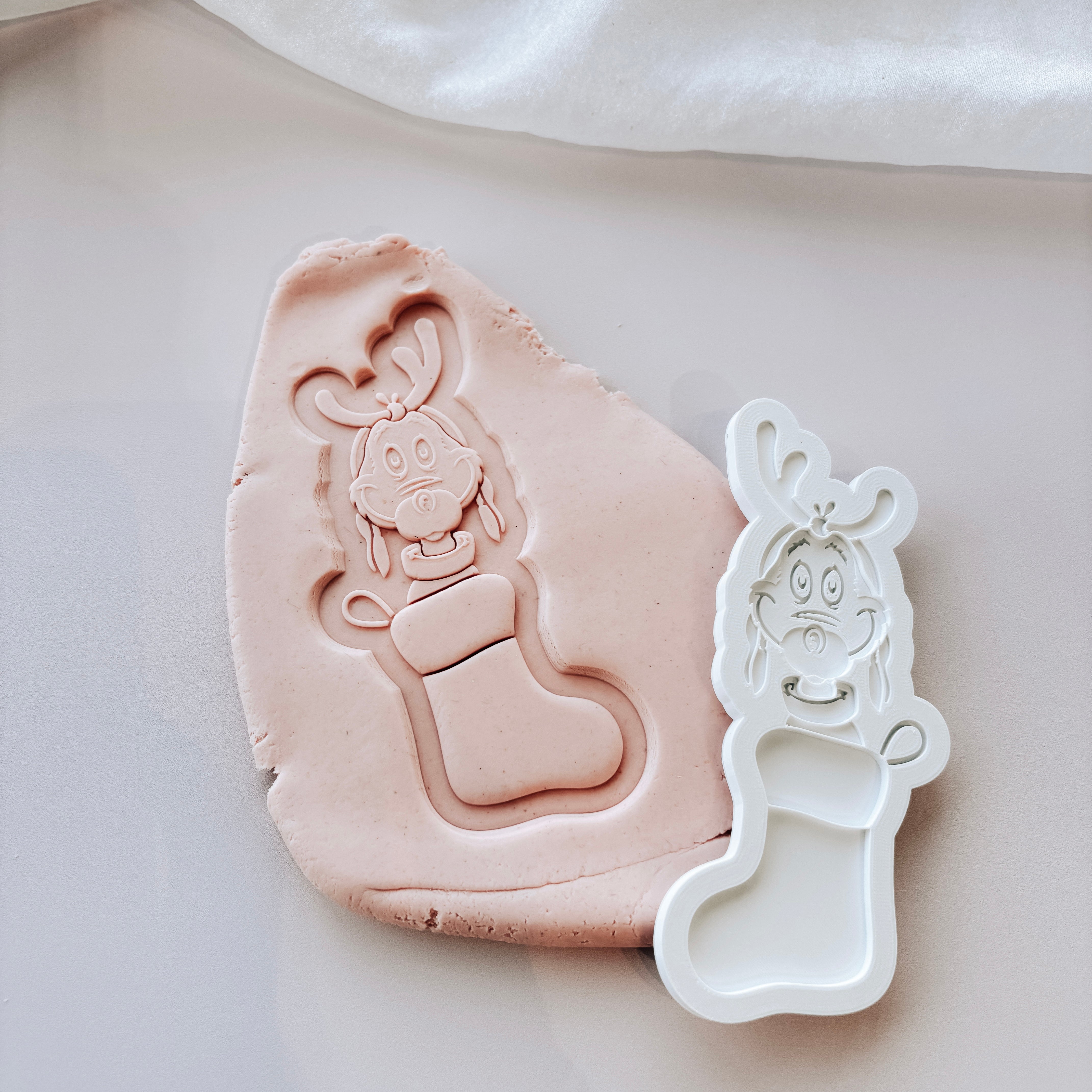 Grinch Dog Max in Stocking stamp and cutter