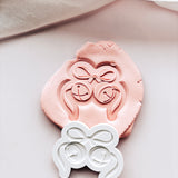 Jingle bells with ribbon bow stamp and cutter