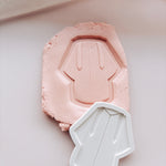 Graduation gown stamp and cutter