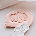 Graduation scroll stamp and cutter
