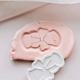 Graduation scroll stamp and cutter
