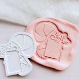 Thick candy cane with bow and blank tag stamp and cutter