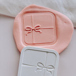 Elegant square Christmas present with fancy bow stamp and cutter