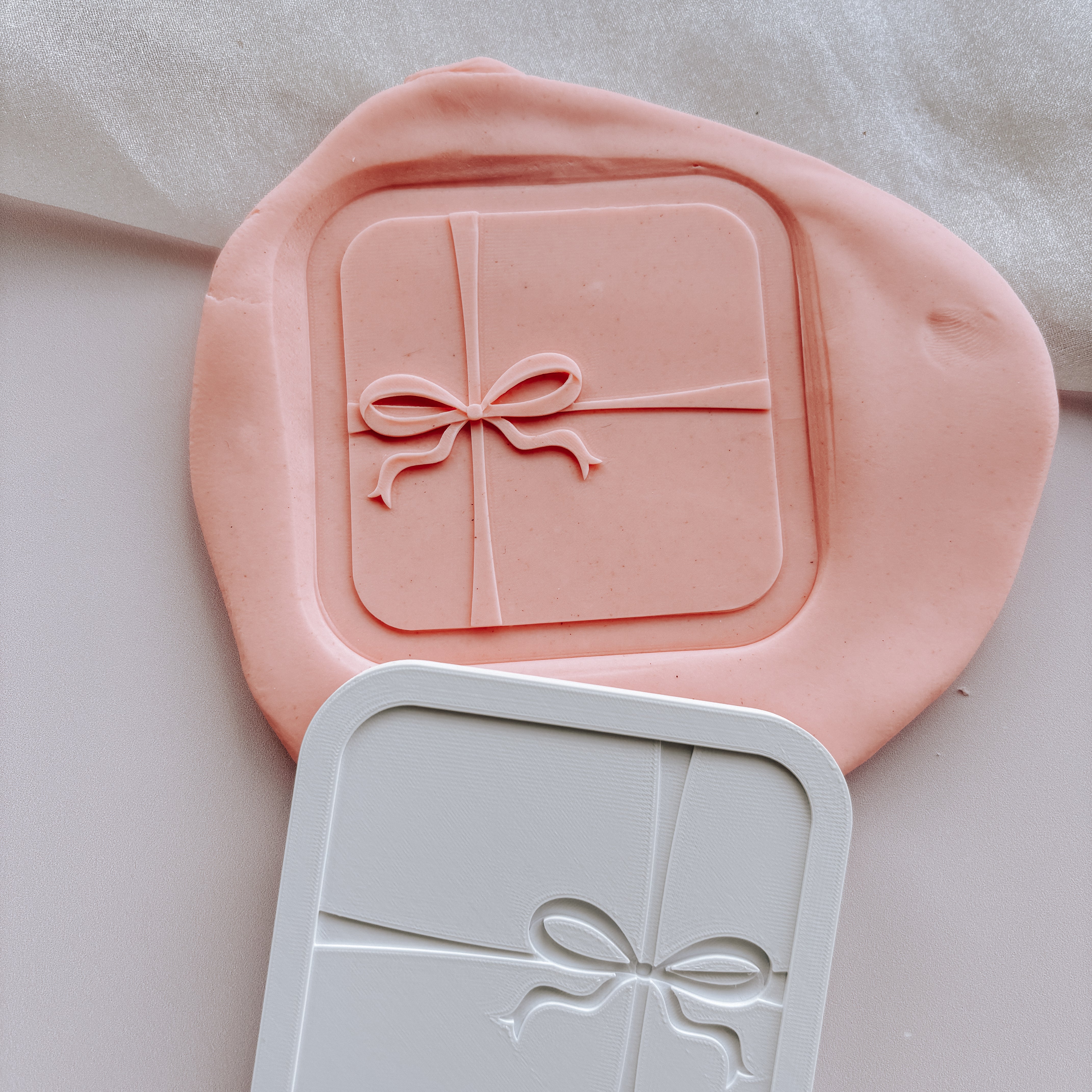 Elegant square Christmas present with fancy bow stamp and cutter
